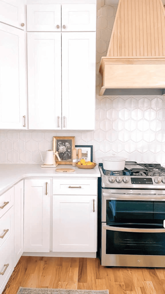 white kitchen, brass accents