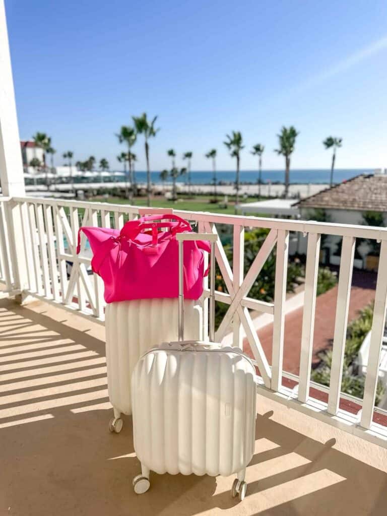 Luggage on balcony with ocean background