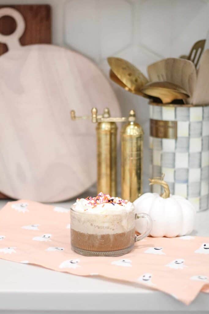 Sprinkled coffee on white kitchen countertop