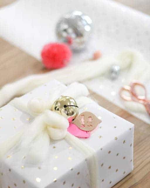 Christmas present with white and pink and gold decor