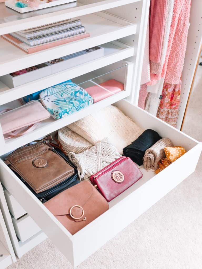 Small wallets and purses in a pull out drawer