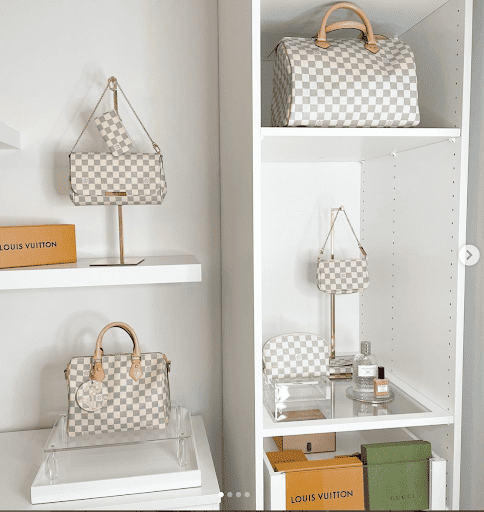 Handbags in a closet displayed