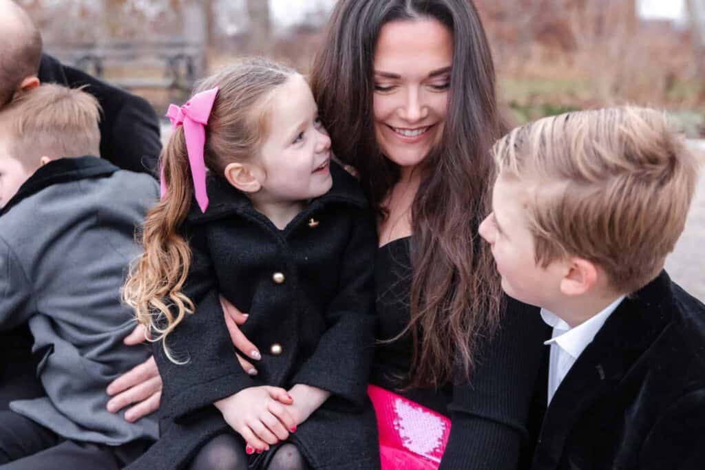 Family Photoshoot Outfit Ideas To Wear In Winter Black and Pink theme