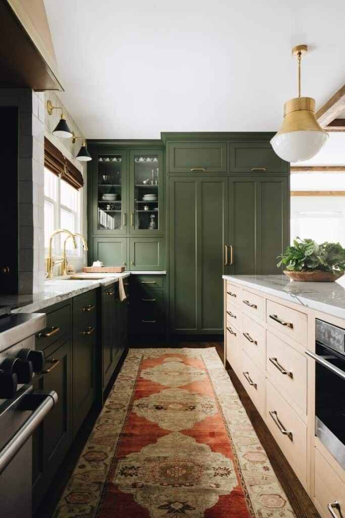 Earthy kitchen with green painted cabinets