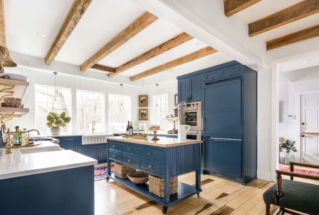 Blue kitchen with exposed beams