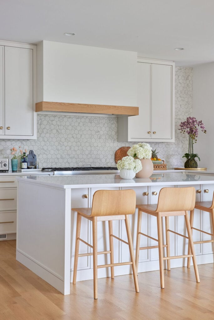 Natural kitchen stool in white kitchen