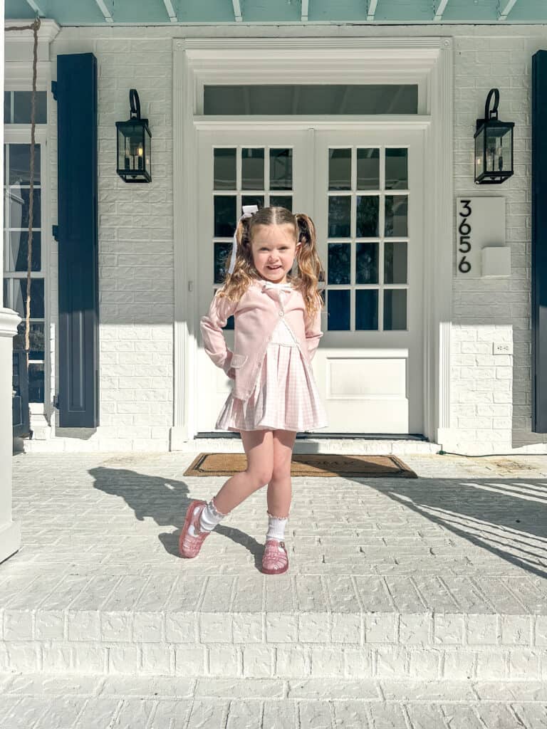 Little girl on front steps
