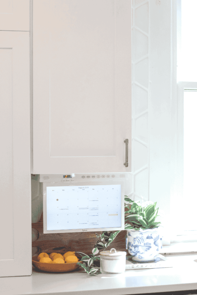 White cabinets and undercabinet screen